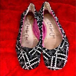 Tom’s size 8.5 flats.